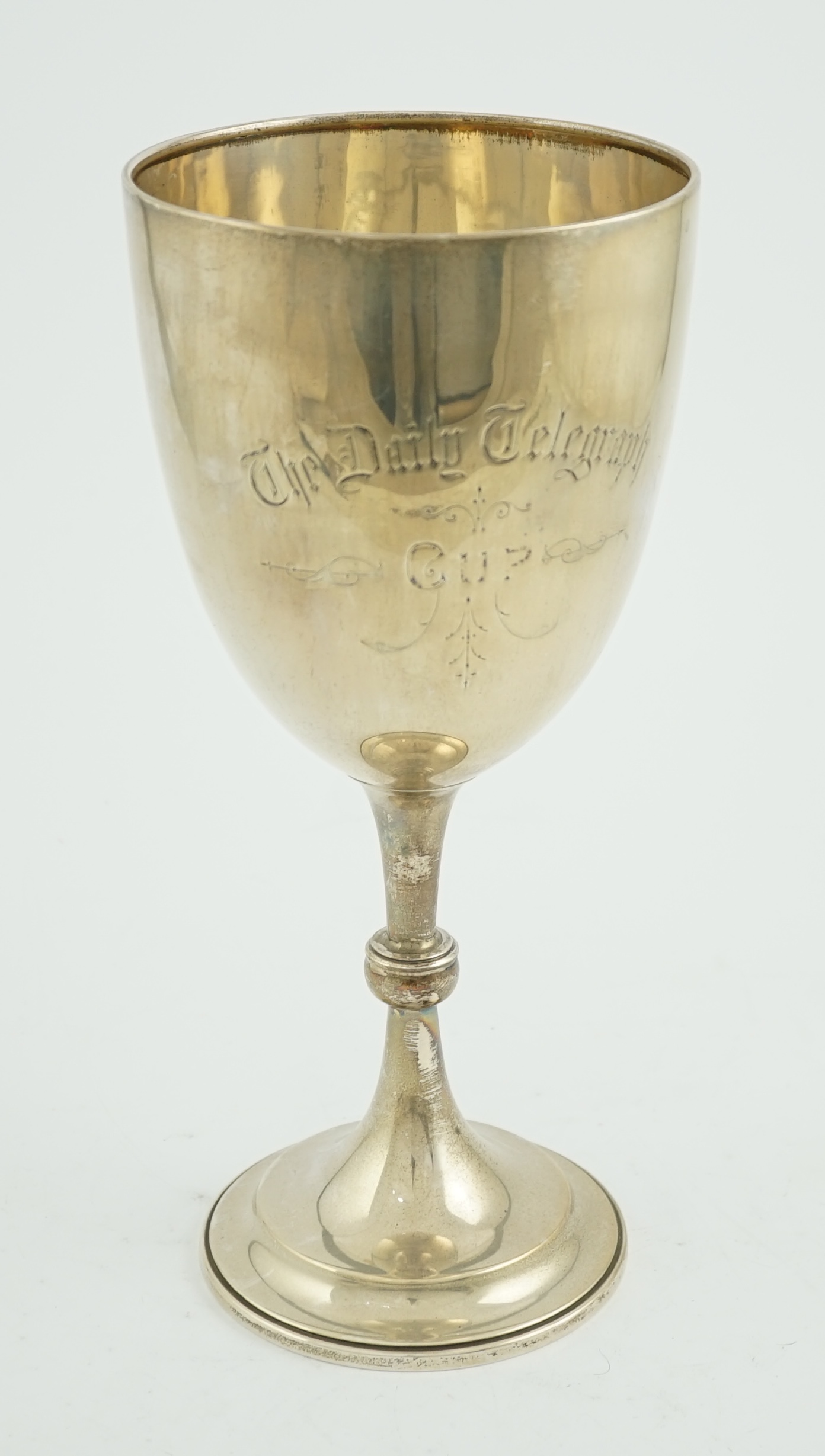 A large Edwardian silver presentation trophy cup, inscribed ' The Daily Telegraph Cup', maker CW